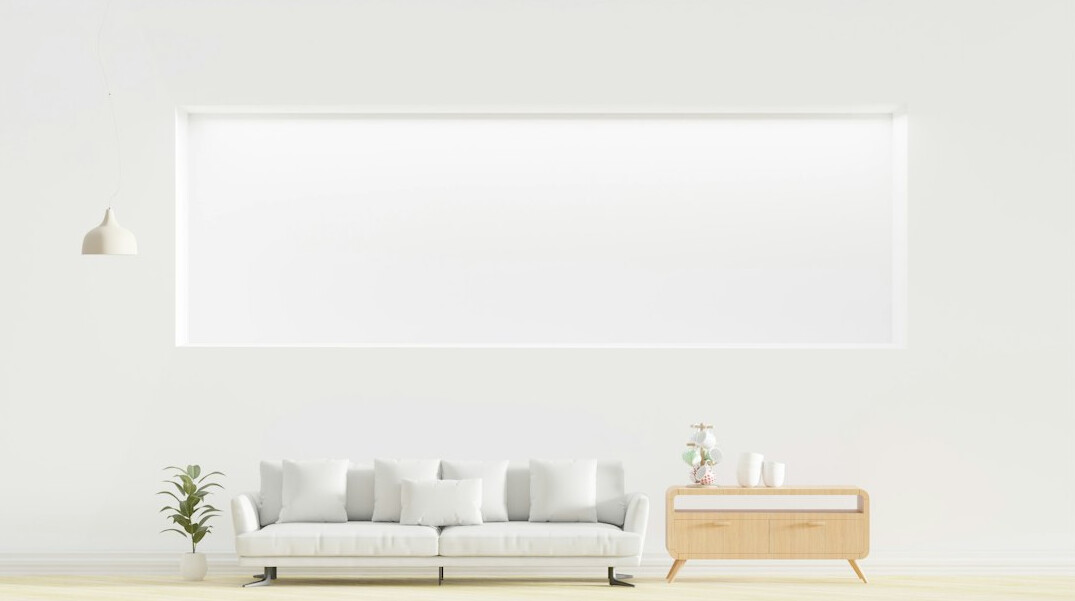 Minimal bright living room with a sofa and a wooden table