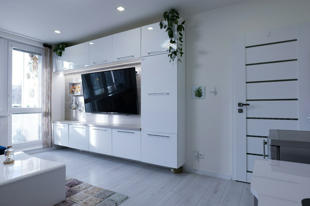 Bright living room with a window and wooden floor
